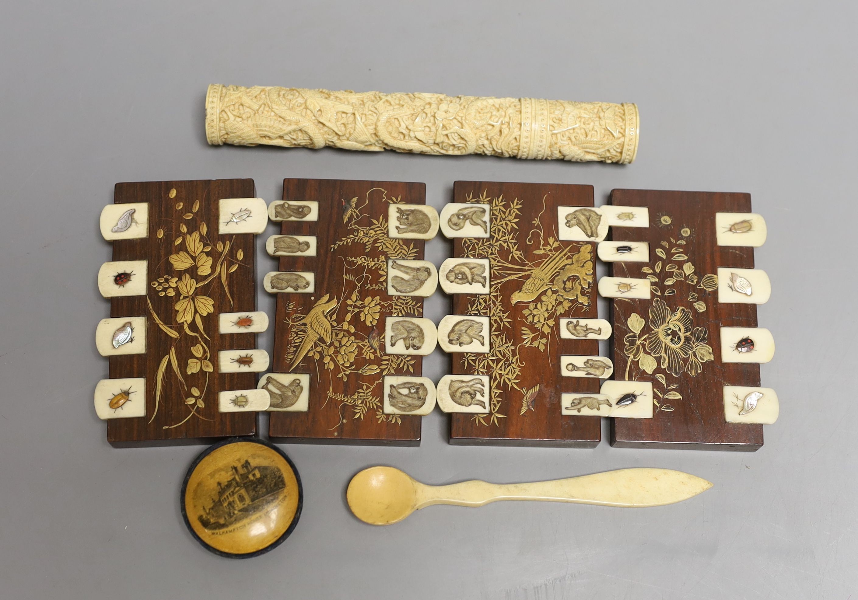 Four Japanese lacquer whist markers, a Chinese ivory needle case, a pincushion and a bone spoon, tallest 15cm